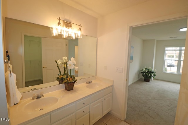 bathroom featuring vanity and an inviting chandelier