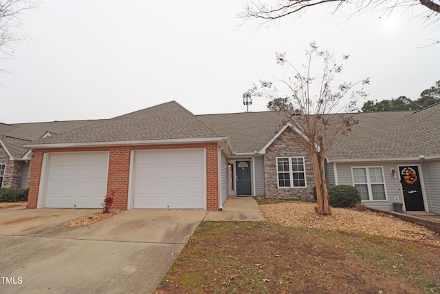 ranch-style home featuring a garage