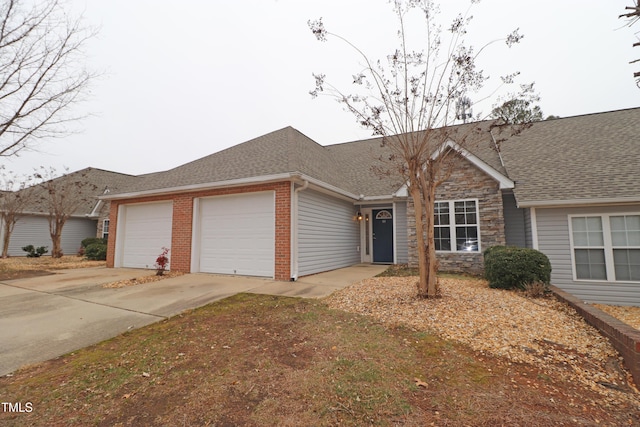 ranch-style house featuring a garage