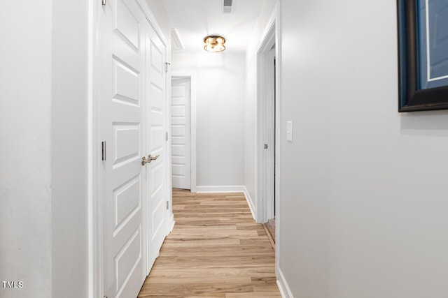 hallway featuring light wood-type flooring