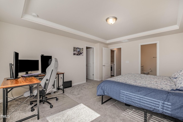 bedroom featuring a tray ceiling, ornamental molding, and carpet flooring