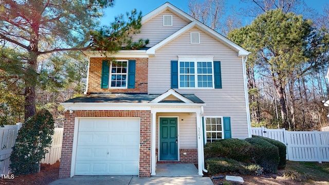 front of property with a garage