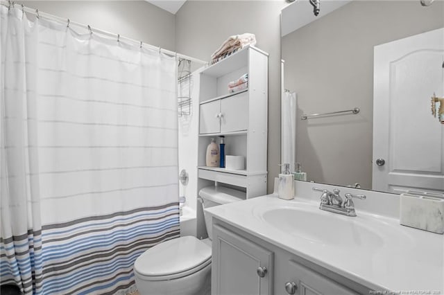 full bath featuring toilet and vanity