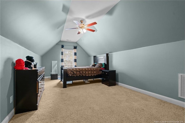 bedroom featuring lofted ceiling, light colored carpet, baseboards, and ceiling fan