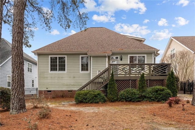 back of house featuring crawl space, a wooden deck, stairs, and a shingled roof