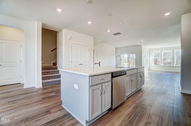 851 Parc Townes Dr Unit 10, Wendell, NC 27591 - kitchen with sink, gray cabinets, stainless steel dishwasher, and an island with sink