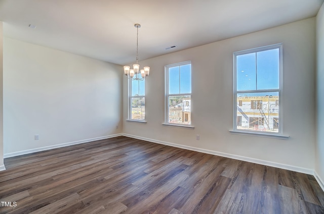 851 Parc Townes Dr Unit 10, Wendell, NC 27591 - empty room with a notable chandelier and dark hardwood / wood-style flooring