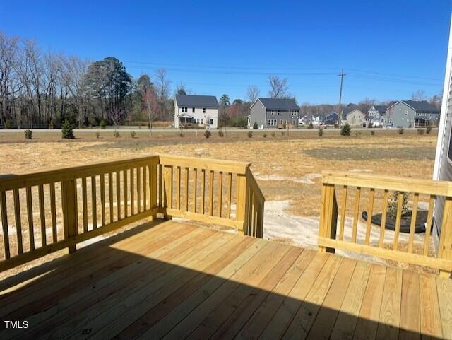 85 N Stagecoach Dr, Wendell, NC 27591 - wooden terrace with a residential view