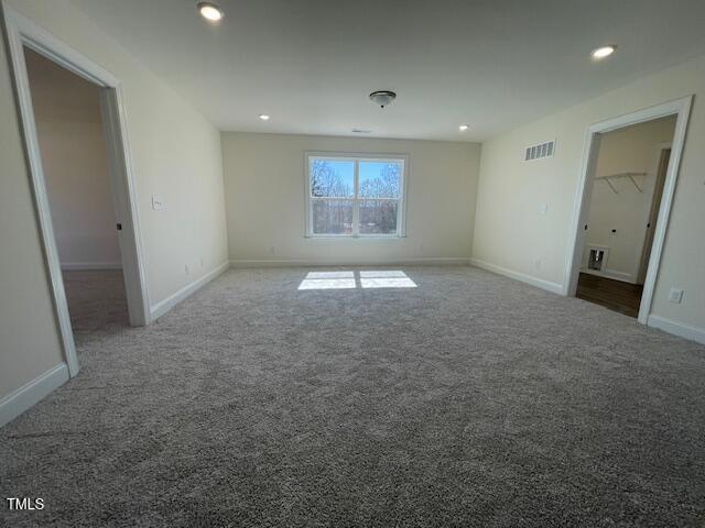 85 N Stagecoach Dr, Wendell, NC 27591 - unfurnished bedroom featuring carpet, recessed lighting, and baseboards
