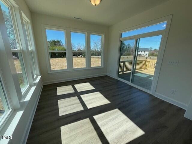 85 N Stagecoach Dr, Wendell, NC 27591 - unfurnished sunroom with baseboards and wood finished floors