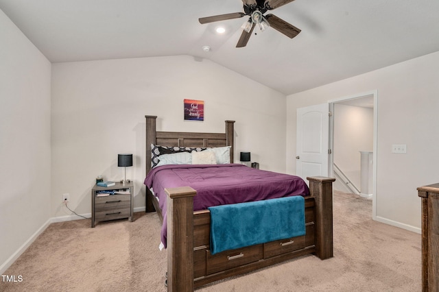 carpeted bedroom featuring vaulted ceiling and ceiling fan