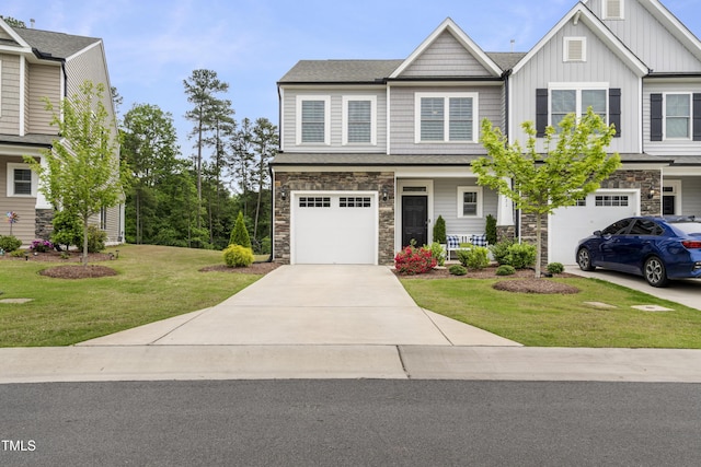 view of front of property featuring a porch, a front yard, and a garage