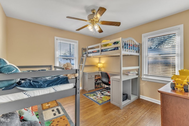 bedroom featuring ceiling fan and light hardwood / wood-style floors