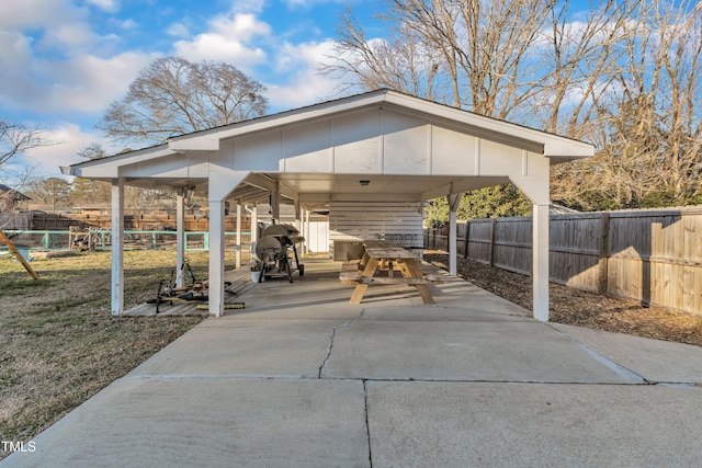 view of patio / terrace with a carport