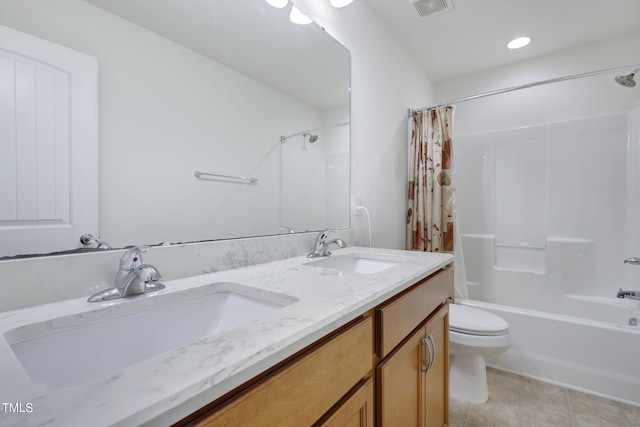 full bath featuring toilet, shower / bath combo, visible vents, and a sink