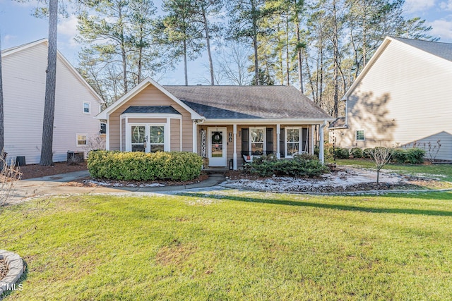 view of front of home featuring covered porch, a front lawn, and cooling unit