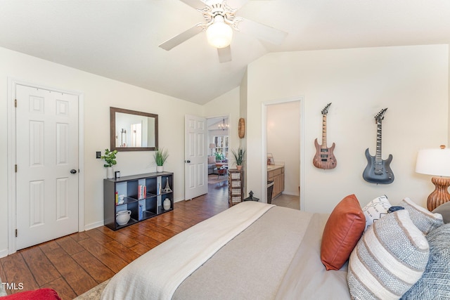 bedroom featuring ensuite bathroom, vaulted ceiling, ceiling fan, and hardwood / wood-style flooring