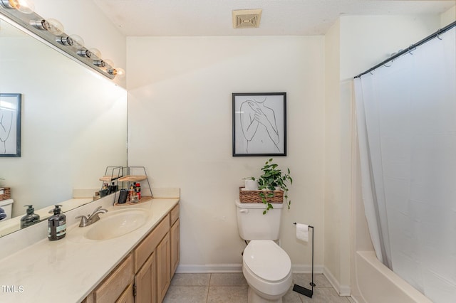 full bathroom with tile patterned flooring, vanity, toilet, and shower / bath combo with shower curtain