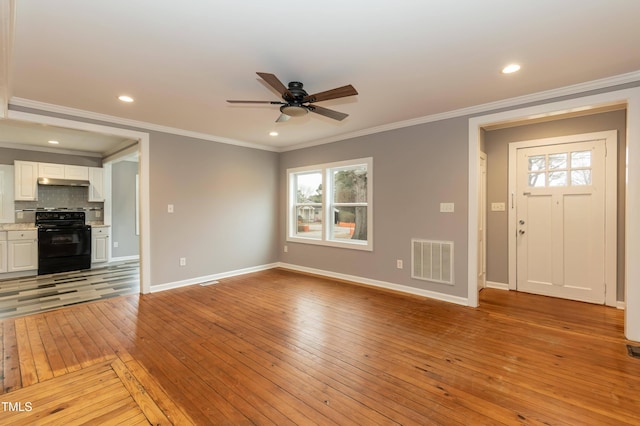 unfurnished living room featuring crown molding, ceiling fan, and light wood-type flooring