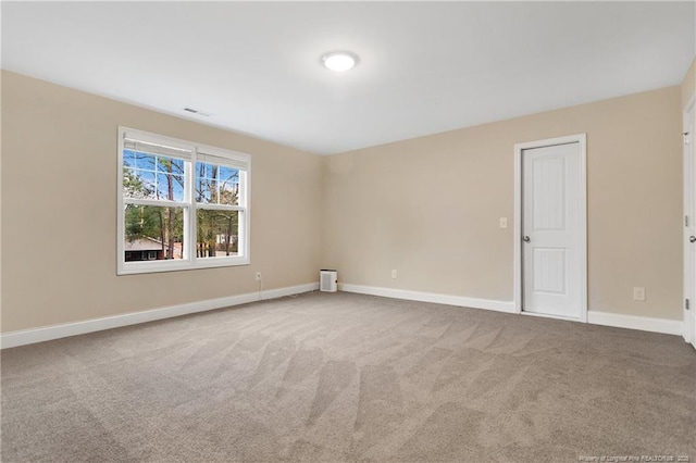 view of carpeted spare room