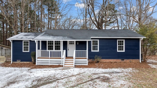 single story home featuring covered porch