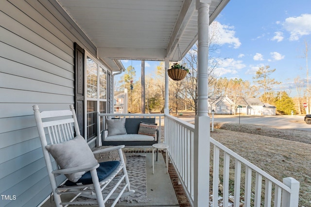 balcony featuring covered porch