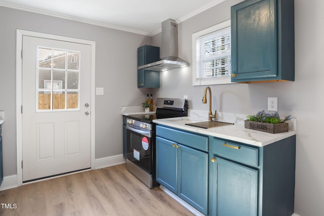 kitchen with blue cabinets, stainless steel electric range, ornamental molding, wall chimney exhaust hood, and sink