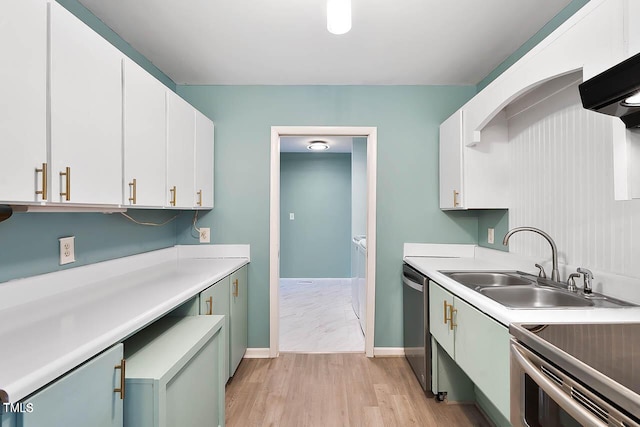 kitchen with white cabinetry, sink, stainless steel dishwasher, exhaust hood, and light wood-type flooring