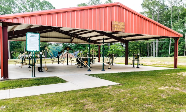 view of community featuring a playground and a yard