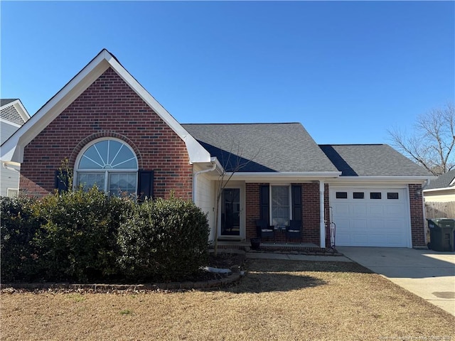 view of front of home with a porch and a garage