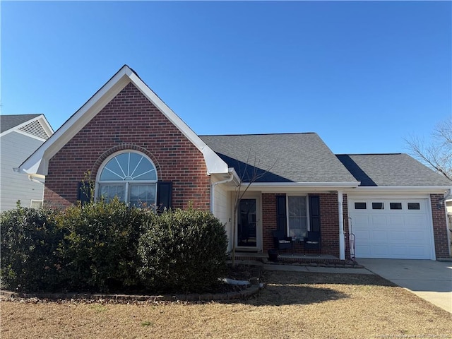 view of front of house featuring a porch and a garage