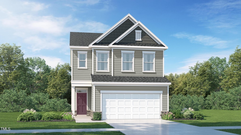 view of front facade featuring a front lawn and a garage