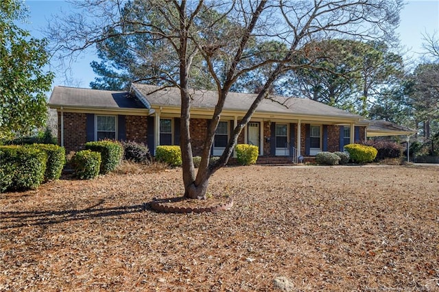 ranch-style home with a carport