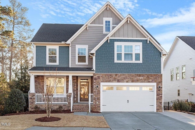 craftsman-style house with a garage and covered porch