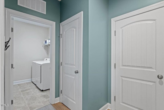 laundry room featuring washer and dryer