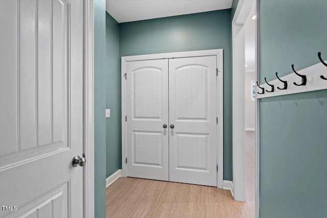 corridor featuring light hardwood / wood-style flooring