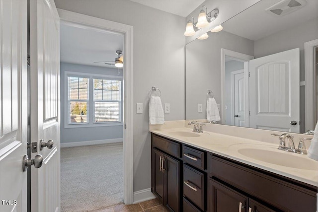 bathroom with vanity and ceiling fan