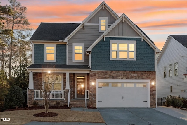 craftsman house featuring a garage and a porch