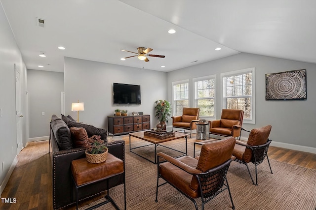 living room with lofted ceiling, wood-type flooring, and ceiling fan