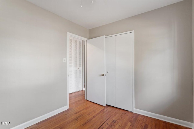 unfurnished bedroom with light hardwood / wood-style flooring