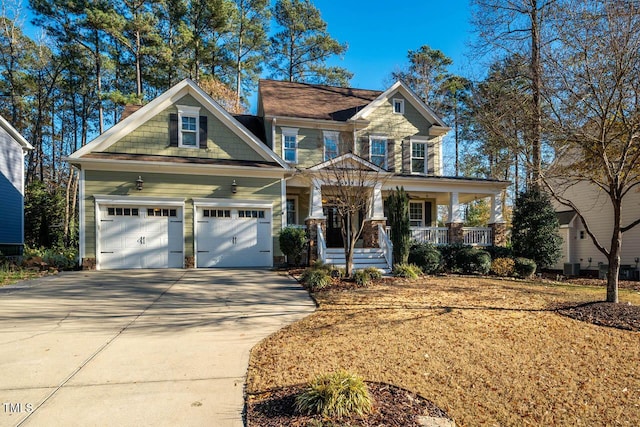 craftsman-style house with a porch and a garage