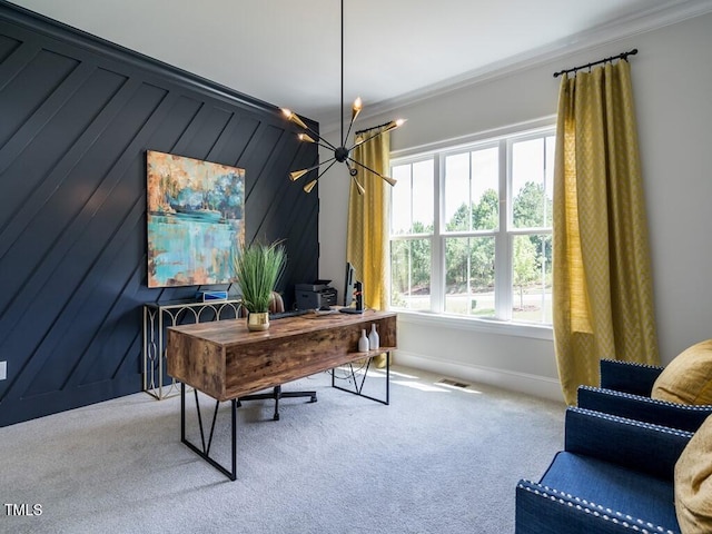 carpeted office space with crown molding and a chandelier