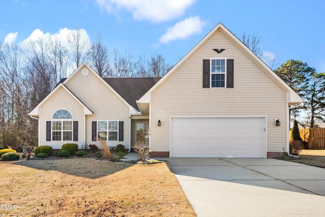 front facade with a front lawn and a garage