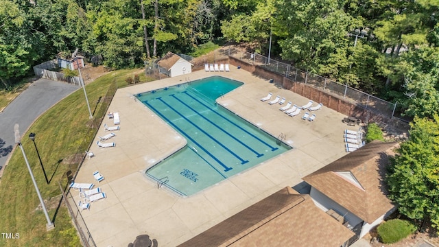 view of swimming pool with a patio