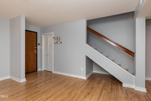 unfurnished living room with light wood-type flooring