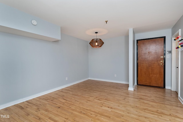 unfurnished room featuring light wood-type flooring