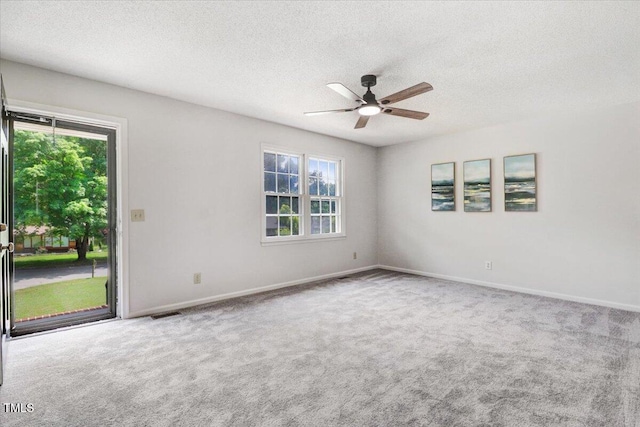 103 Val Del Ct, Garner, NC 27529 - carpeted spare room with ceiling fan, a textured ceiling, and baseboards
