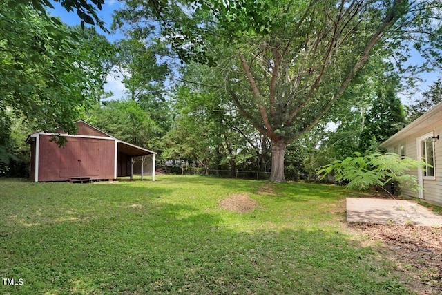 103 Val Del Ct, Garner, NC 27529 - view of yard featuring an outbuilding, view of scattered trees, and a patio