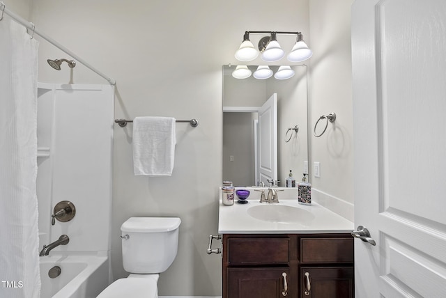 full bathroom with shower / tub combo with curtain, vanity, and toilet