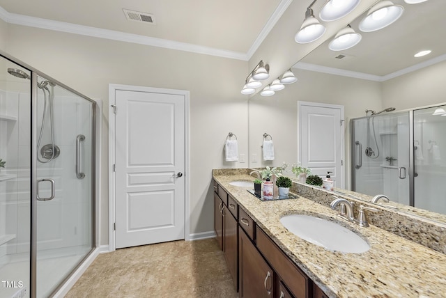 bathroom featuring an enclosed shower, vanity, and ornamental molding